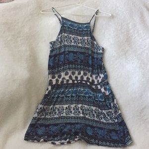 Blue floral patterned romper.